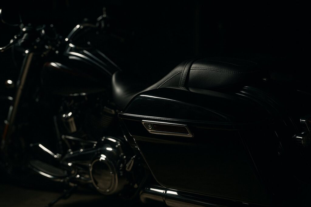 Hard motorcycle saddlebags mounted to a touring bike