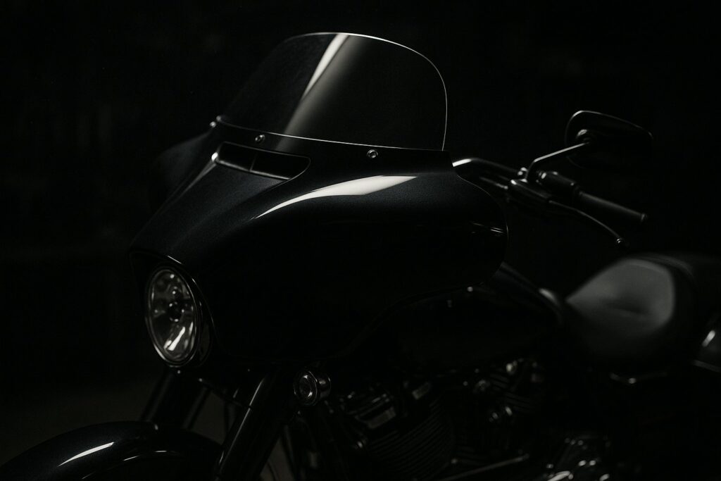 A tinted windshield and fairing on a touring motorcycle